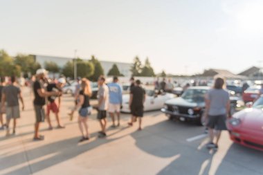 Bulanık hareket Dallas, Texas, ABD yerel otomobil katılan kişi çeşitli grup. Meşgul insanlar tüm yıl, marka ve model araçların tarama.