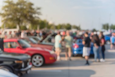 Bulanık hareket Dallas, Texas, ABD yerel otomobil katılan kişi çeşitli grup. Meşgul insanlar tüm yıl, marka ve model araçların tarama.