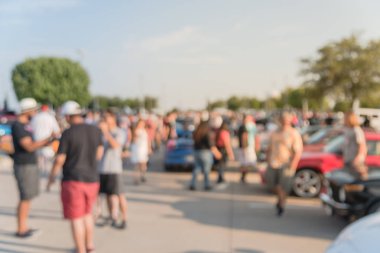 Bulanık hareket Dallas, Texas, ABD yerel otomobil katılan kişi çeşitli grup. Meşgul insanlar tüm yıl, marka ve model araçların tarama.