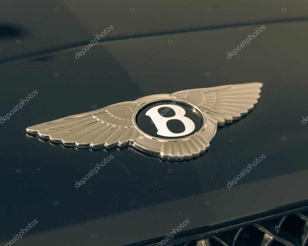 DALLAS, TX, US-JUL 7, 2018:Close-up logo on Bentley luxury car. A British manufacturer and marketer of luxury cars, subsidiary of Volkswagen AG since 1998. Headquarter in Crewe, England. Vintage tone