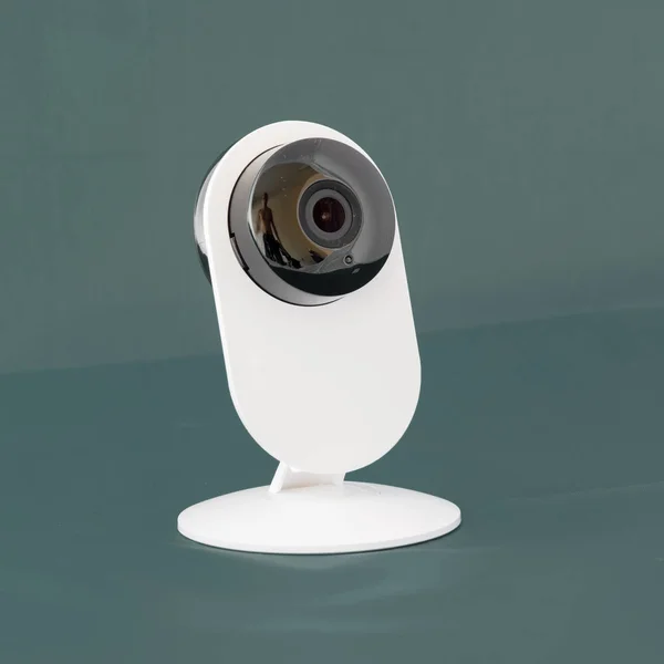 Studio shot wireless IP security surveillance camera on isolated background