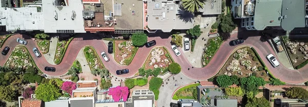 Vintage tone aerial Lombard Street, an east west street in San Francisco, California. Famous for steep, one-block section with eight hairpin turns. Crookedest, steep hills, sharp curves, one-way road