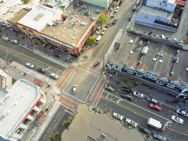 Aerial view Rainbow crosswalk in Castro District, Eureka Valley with typical historic Victorian houses. Famous town San Francisco, California, USA with synonymous with gay culture, LGBT pride