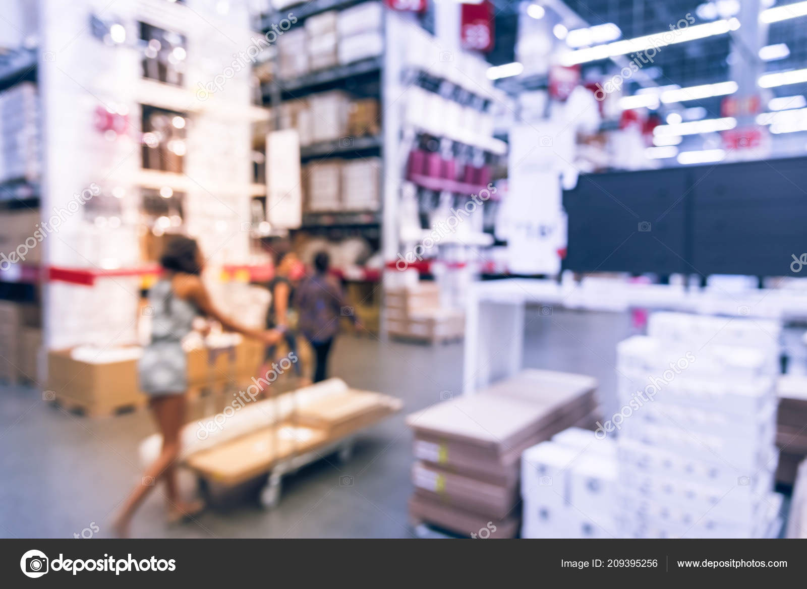 Blurred Customers Shopping Large Furniture Warehouse Row Aisles