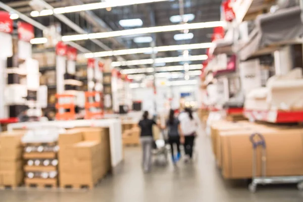 Blurred Customers Shopping Large Furniture Warehouse Row Aisles Bins Floor — Stock Photo, Image