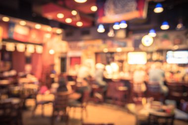 Bulanık görüntü spor ve bamya, Tv, klasik sayaç, Masa ve sandalyeler Houston, Texas, istiridye barı bize. Happy Hour bar, akşam yemeği arka plan. Gece kulübü, ızgara bar kavramı. Vintage filtre.