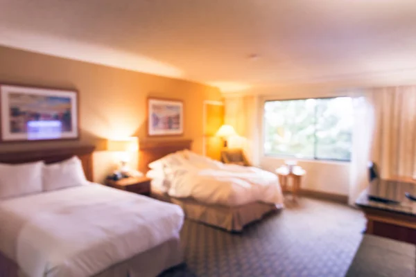 Blurred typical double room with windows in American hotel