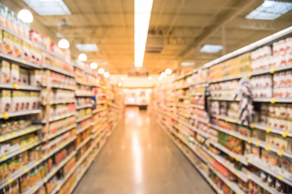 Blurry background condiment, pasta, canned vegetable aisle in gr — Stock Photo, Image