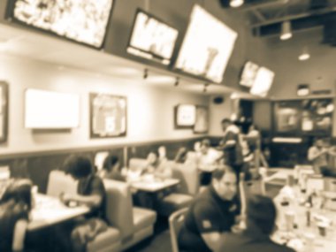 Vintage sesi soyut spor barlar restoranlar ABD'de bulanık. Ufuk kişi spor izle, bira içmek ve Amerikan mutfağı yemek