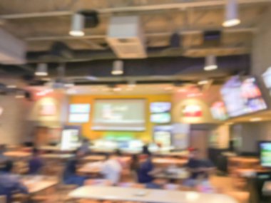 Bulanık soyut barlar restoranlar ABD spor. Ufuk kişi spor izle, bira içmek ve Amerikan mutfağı yemek