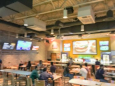 Bulanık soyut barlar restoranlar ABD spor. Ufuk kişi spor izle, bira içmek ve Amerikan mutfağı yemek