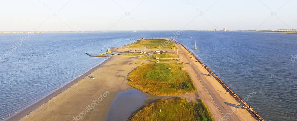 Panorama aerial view famous Texas City Dike, a levee that projects nearly 5miles south-east into mouth of Galveston Bay. It was designed to reduce the impact of sediment accumulation along lower Bay