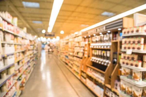 Kahve, çay, meyve suyu, Houston, Teksas, mağazada pişirme ve fındık ezmesi koridorda bulanık görüntü bize. Geniş süpermarket raflarında çeşitli ürünler ekran ile görüntüleyin. Ufuk bulanıklık arka plan, bokeh ışık