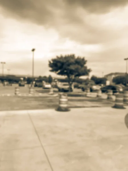 Filtered tone blurry background construction site at parking lot — Stock Photo, Image