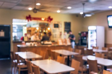 Hareket iç hızlı Tay Restoran Cafe şehir Houston bulanık. Klasik masa sandalye yemek ve insanlar yemek yemek siparişi sayaç ve meyve suyu su dağıtıcısı, self servis için