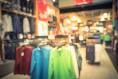 Vintage sesi görüntü iç spor ve fitness Giyim Mağazası Amerika'da bulanık. Spor salonu ile spor ayakkabıları, dişli, giyim dünya çapında ünlü spor moda markası. Sağlıklı yaşam konsepti