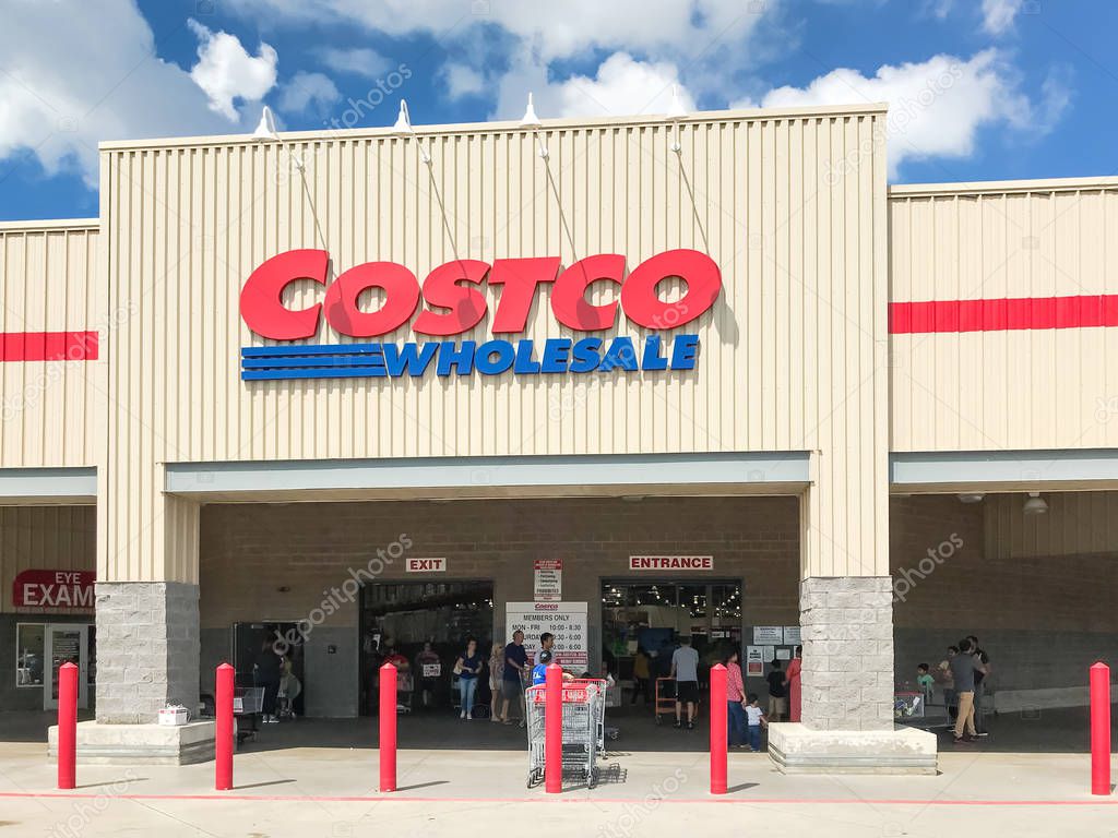 Lewisville, TX, USA-SEPT 15, 2018:Customers enter entrance, storefront of Costco Wholesale cloud blue sky. It the largest membership-only warehouse club in USA with total of 705 warehouses worldwide