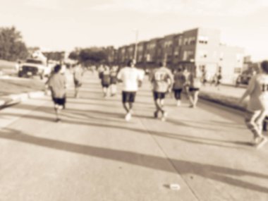 Vintage sesi hareket bulanık grup koşucu tüm yeteneklerin Richardson, Texas, 5 k Kurumsal Challenge yarışında bize. Fitness, sağlıklı yaşam konsepti. Yollarda çalışan sporcular. Kentsel spor olay