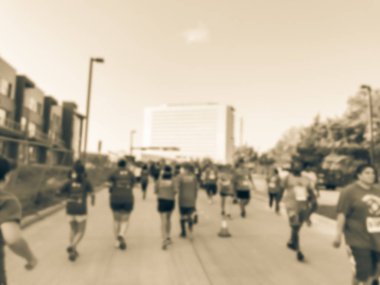 Vintage sesi hareket bulanık grup koşucu tüm yeteneklerin Richardson, Texas, 5 k Kurumsal Challenge yarışında bize. Fitness, sağlıklı yaşam konsepti. Yollarda çalışan sporcular. Kentsel spor olay