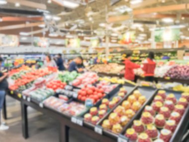 Taze meyve ve sebzeler Irving, Texas, bakkal alışveriş bulanık hareket meşgul müşteri bize. Organik, yörede yetiştirilen ekranda üretir. Süpermarkette sağlıklı gıda arka plan
