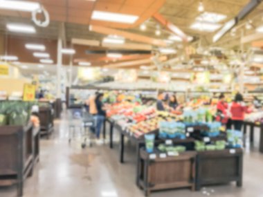 Taze meyve ve sebzeler Irving, Texas, bakkal alışveriş bulanık hareket meşgul müşteri bize. Organik, yörede yetiştirilen ekranda üretir. Süpermarkette sağlıklı gıda arka plan