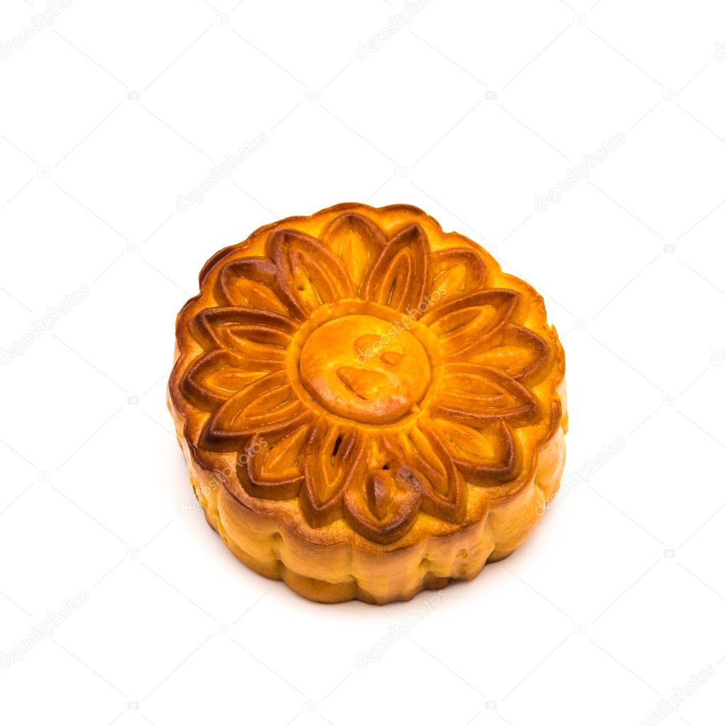 Close-up top view single traditional moon cake isolated on white background. Round pastry mooncake for Vietnamese and Chinese mid-autumn festival. Food concept with clipping path and copy space.