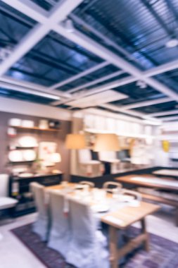 Bulanık görüntü çeşitli yemek odası mobilya perakende mağaza Amerika'da ayarlar. Ufuk yemek masa sandalye ve ev aksesuarları, dekorasyon fikir showroom Galeri araya hazır