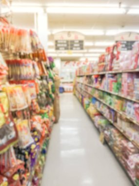 Bulanık soyut şeker, tanımlama bilgileri, kurutulmuş et, Garland, Teksas, Amerika'nın Asya bakkal Atıştırma zamanı. Bölümü süpermarkette fiyat etiketleri ile ekranda koridor ufuk tatlı davranır