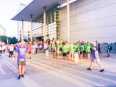 Vintage sesi arka plan çalışan üniformalı Richardson, Texas, ABD 5 k Kurumsal Challenge yarış katılın. Katılımcı kentsel spor olay bulanık kavramı çeşitli çok ırklı Grup