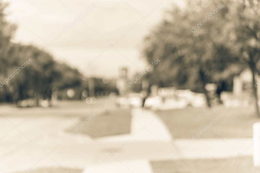 Vintage tone blurred row of yard signs at residential street for primary election day in Dallas county, Texas, US. Signs greeting early voters, political party posters for the midterm election concept