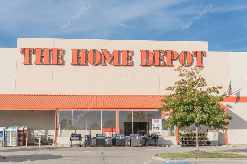 IRVING, TX, US-OCT 30, 2018:Home Depot exterior storefront with autumn leaves color. A home improvement supply superstore, big-box that sells hardwares, construction products, tool rental services
