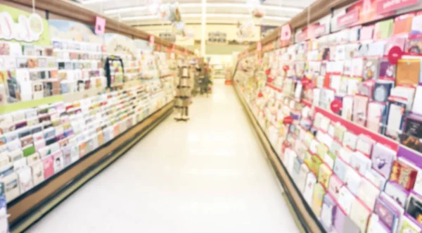 Panorama view blurred abstract greeting cards and balloons display at grocery store in Texas, America.