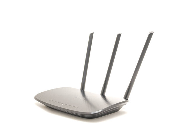 Studio shot of black wireless router cable modem with antenna isolated on white background. Front view with indicator lights