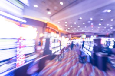 Tipik kumar arka plan. Bulanık slot makineleri, temalı oyun slot poker 777, silahlı çete'ye oyuncular Oklahoma Casino rulet. Dijital makine satırda renkli ışıklı ışık