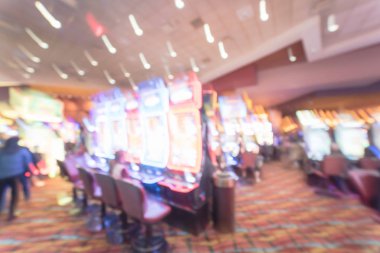 Tipik kumar arka plan. Bulanık slot makineleri, temalı oyun slot poker 777, silahlı çete'ye oyuncular Oklahoma Casino rulet. Dijital makine satırda renkli ışıklı ışık