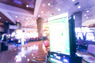 Tipik kumar arka plan. Bulanık slot makineleri, temalı oyun slot poker 777, silahlı çete'ye oyuncular Oklahoma Casino rulet. Dijital makine satırda renkli ışıklı ışık