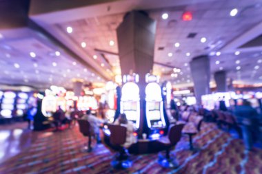 Tipik kumar arka plan. Bulanık slot makineleri, temalı oyun slot poker 777, silahlı çete'ye oyuncular Oklahoma Casino rulet. Dijital makine satırda renkli ışıklı ışık