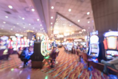 Tipik kumar arka plan. Bulanık slot makineleri, temalı oyun slot poker 777, silahlı çete'ye oyuncular Oklahoma Casino rulet. Dijital makine satırda renkli ışıklı ışık