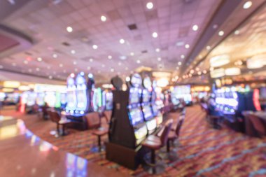 Tipik kumar arka plan. Bulanık slot makineleri, temalı oyun slot poker 777, silahlı çete'ye oyuncular Oklahoma Casino rulet. Dijital makine satırda renkli ışıklı ışık