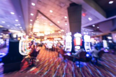 Tipik kumar arka plan. Bulanık slot makineleri, temalı oyun slot poker 777, silahlı çete'ye oyuncular Oklahoma Casino rulet. Dijital makine satırda renkli ışıklı ışık