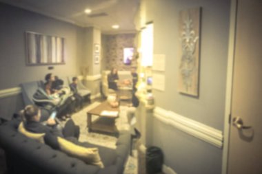 Kadın hastalıkları kadın hastalıkları bebek arabası ile bekleyen bulanık hareket hastalarım. Defocused Tıp Merkezi Hastanesi ofis, Aile Hekimliği birinci basamak sağlık kliniği Tv ve Amerika'da kanepe