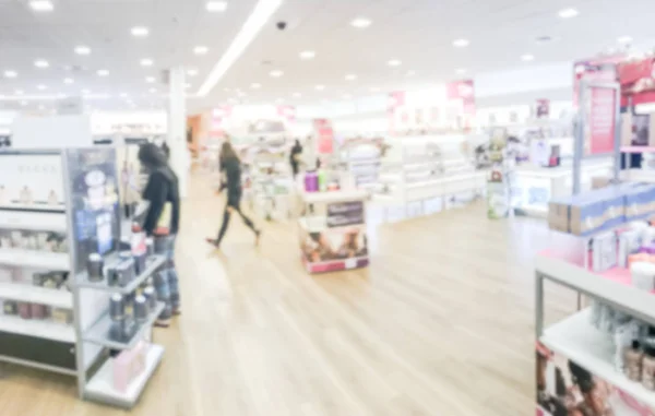 Blurred motion customer shopping at beauty stores in Texas, USA. Variety of prestige & mass cosmetics, makeup, fragrance, skincare, bath & body, hair care tools & salon, nails, tools & brushes
