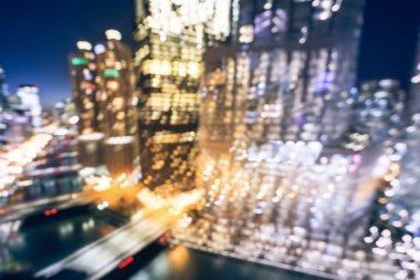 Vintage sesi hareket ufuk Chicago nehir ofis ve konut yüksek katlı bina bulanık. Havadan görünümü kentsel gece ışık bokeh ışıklı silüetini üzerinden