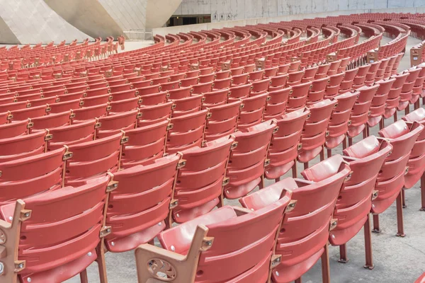 Rear view line of raised orchestra level seats from public outdoor performing art venue in Chicago, America