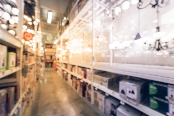 Vintage tone blurred abstract wide selection of ceiling fans with lights on display at hardware store in USA. Defocused background coastal, classic, modern, cottage, rustic, industrial, LED fans