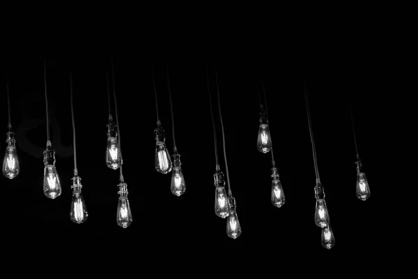 Vintage Tone Close Set Vintage Glowing Light Bulbs Hanging Black — Stock Photo, Image