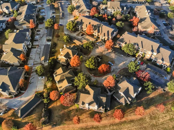 Top view apartment complex near creek with beautiful fall foliag