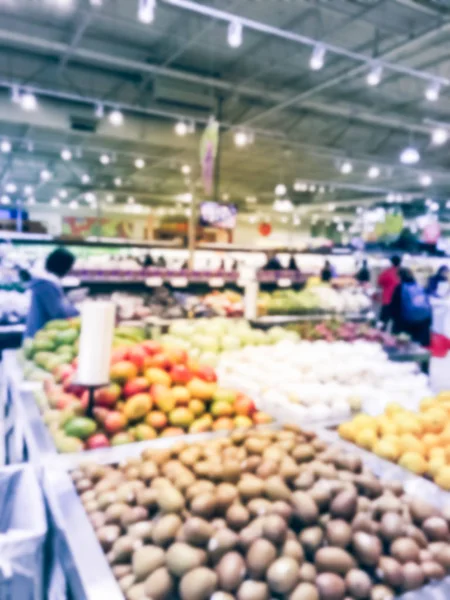 Elmosódott háttér ázsiai élelmiszer-áruház a vevő a vásárlás — Stock Fotó