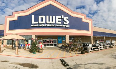 CARROLLTON, TX, US-DEC 9, 2018:Entrance to Lowe's Companies, Inc. retail store chain, an American retail company specializing in home improvement. Headquartered in Mooresville, North Carolina clipart