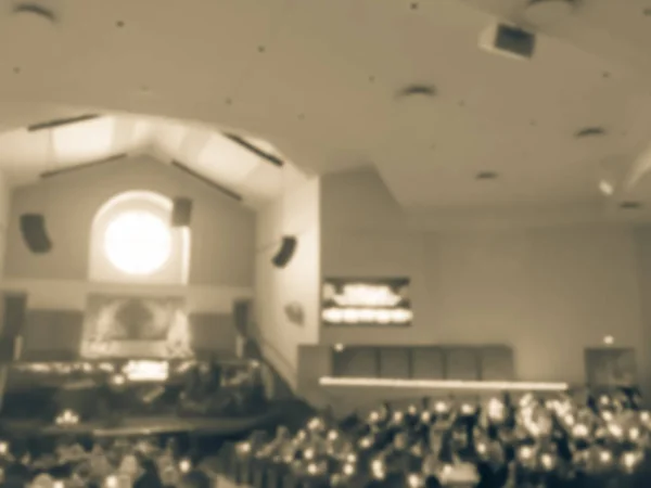 ビンテージ トーンぼやけて照明キャンドルと歌うサイレント ナイトの抽象伝統一緒にアメリカ テキサス州のバプテスト教会で — ストック写真